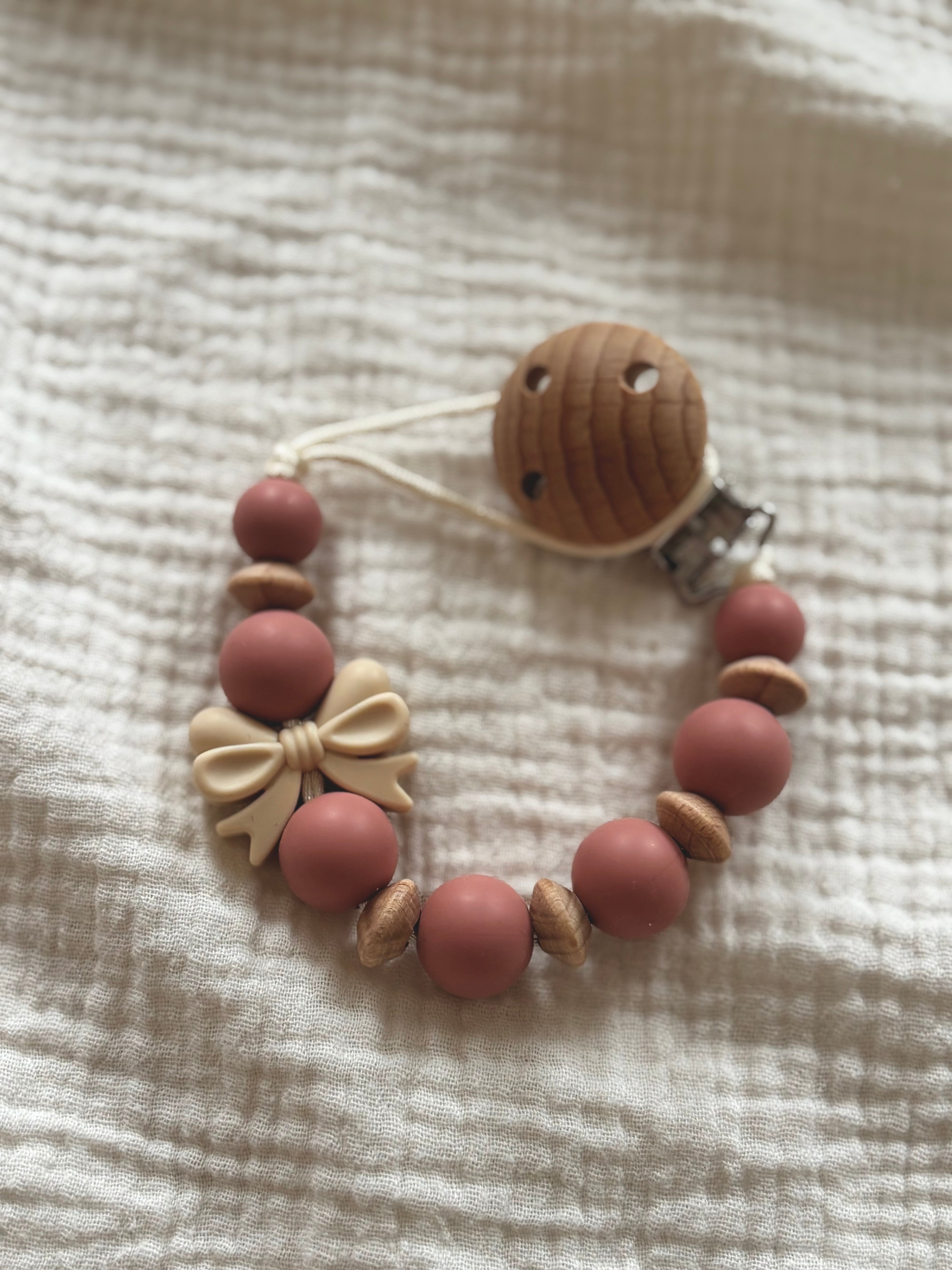 Speenkoord ‘Strik’ | Beige & Roze