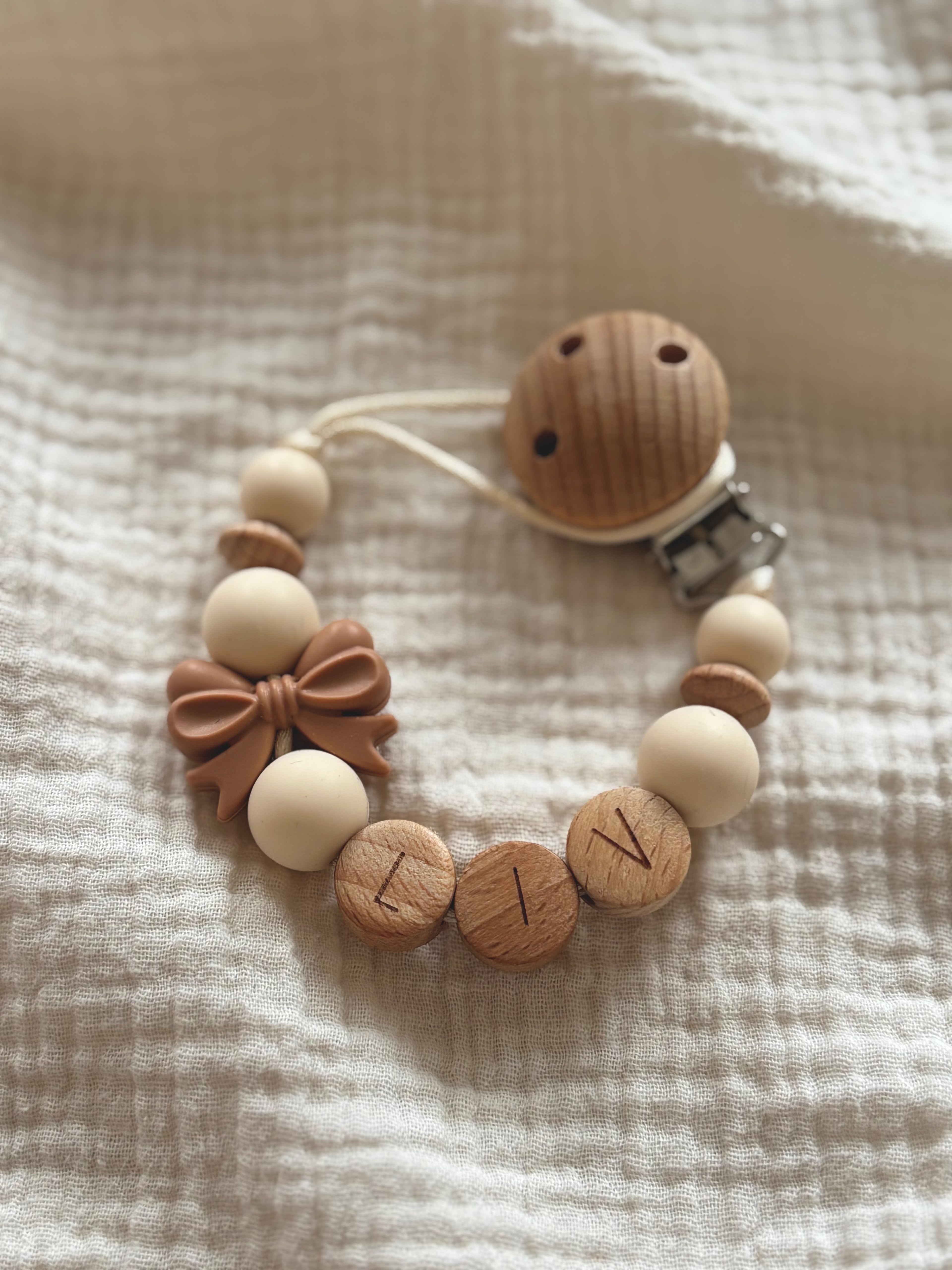 Speenkoord ‘Strik’ met naam | Oudroze